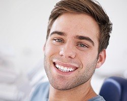 Smiling man in dental chair during dental checkup