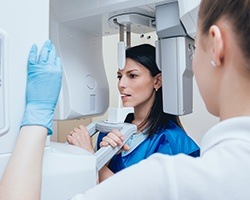Woman receiving 3D dental x-ray scan