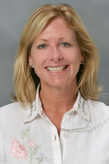 Female patient with discolored teeth before treatment