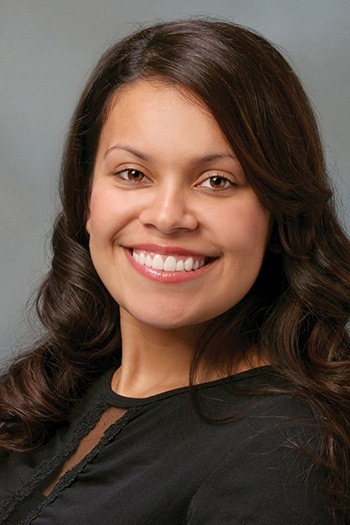 Young woman with perfectly aligned teeth