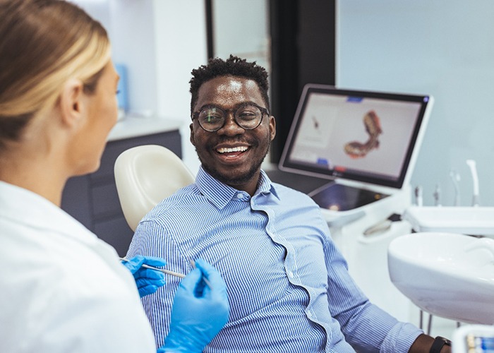 Man in Louetta getting a dental checkup