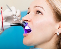 Patient receiving dental bonding treatment