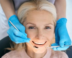A woman about to receive a dental crown