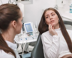 concerned woman at dental checkup 