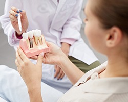 Cleanings and maintenance can help prevent dental implant failure