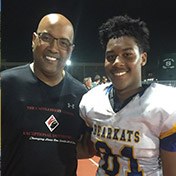 Louetta dentist smiling with teen football player