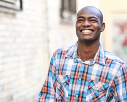 Man with porcelain veneers smiling