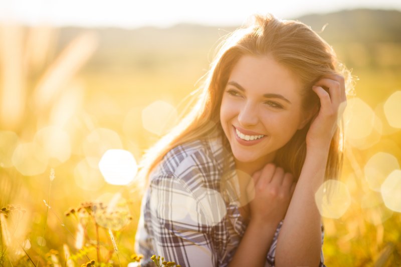 Woman smiling in the sun