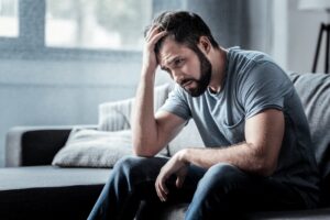 Man experiencing mental health struggles
